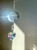 Paw Prints on our Hearts Suncatcher